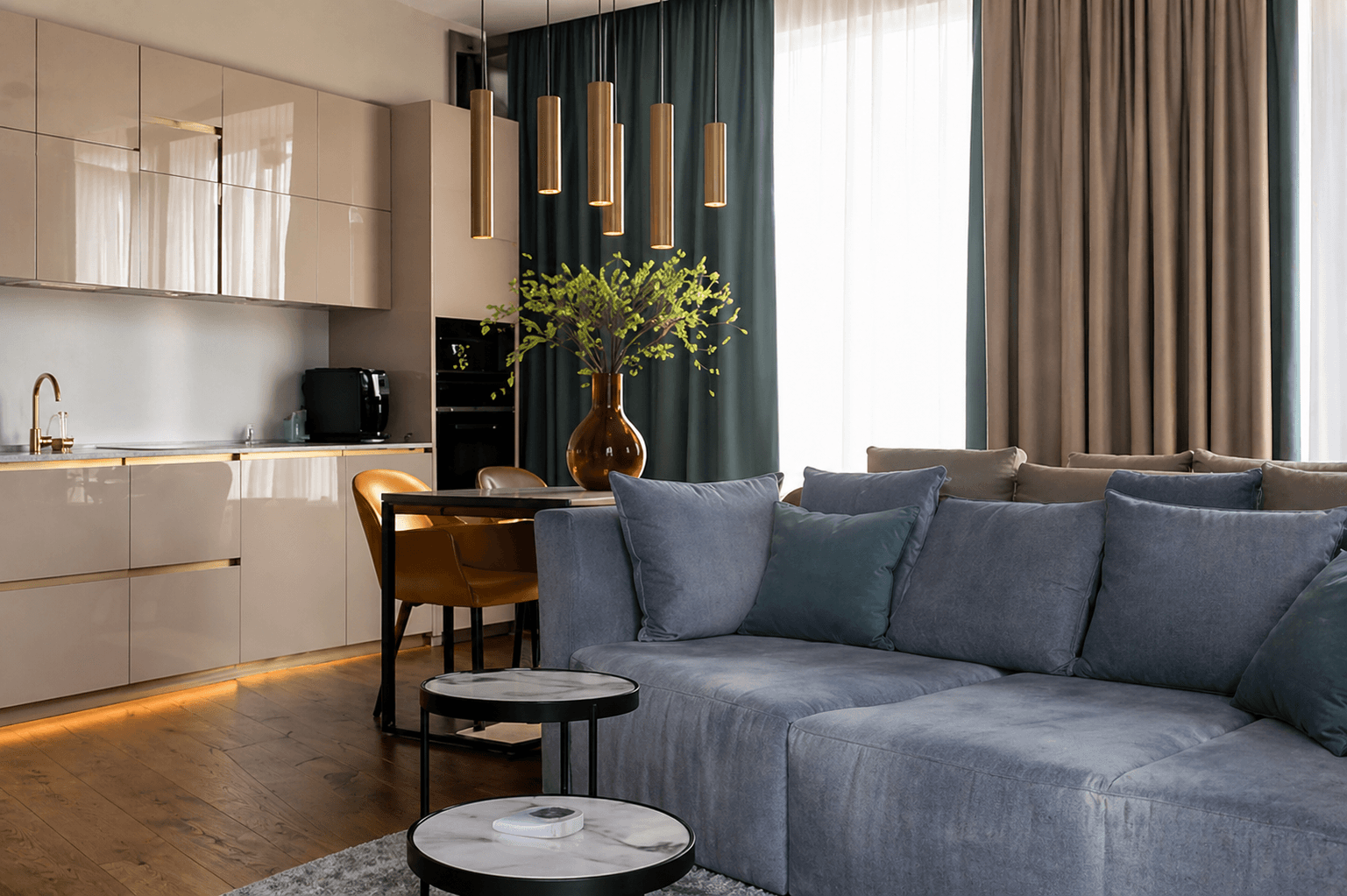 Open-plan kitchen, dining, and living area with modern finishes at the Miami boutique hotel apartments